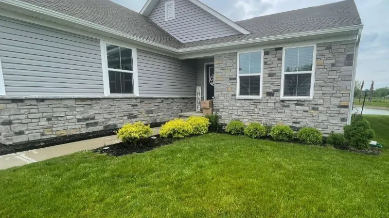 Residential landscaping before outdoor lighting installation in Mentor Ohio