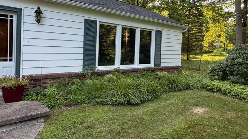 Landscape beds before mulch installation in Lake County Ohio