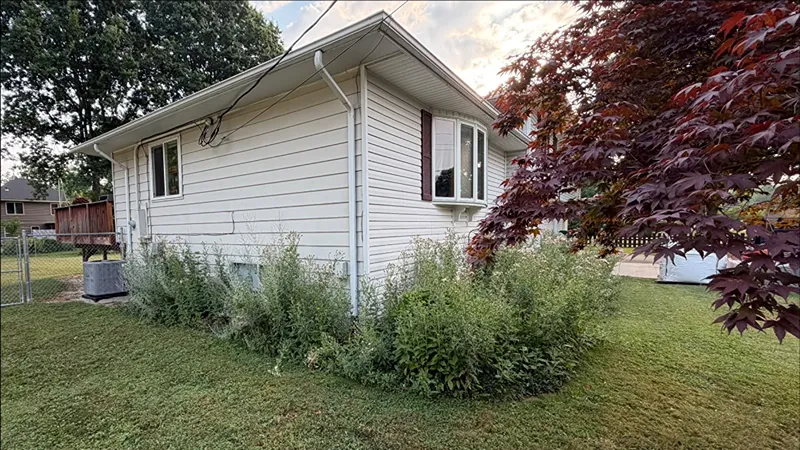Established residential landscaping before renovation in Kirtland Ohio